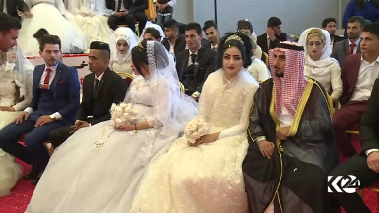 بالصور.. اربيل تحتضن عرسا جماعيا لـ 214 شابا وشابة